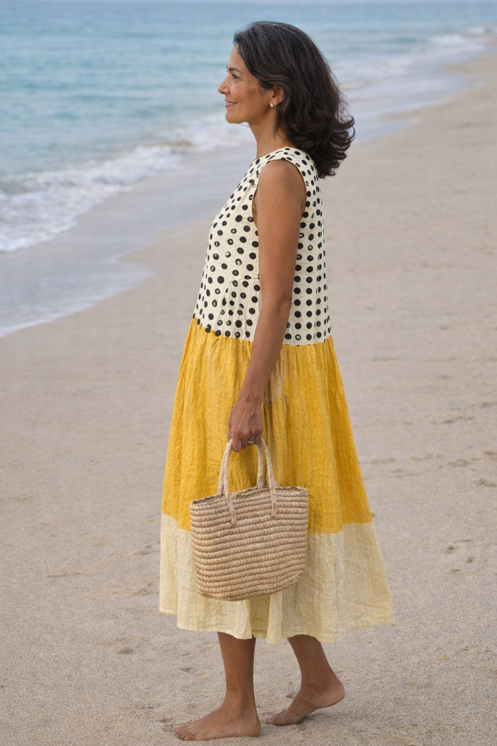 Lía | Vestido midi de bloques de color con lunares